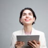 Young businesswoman using tablet