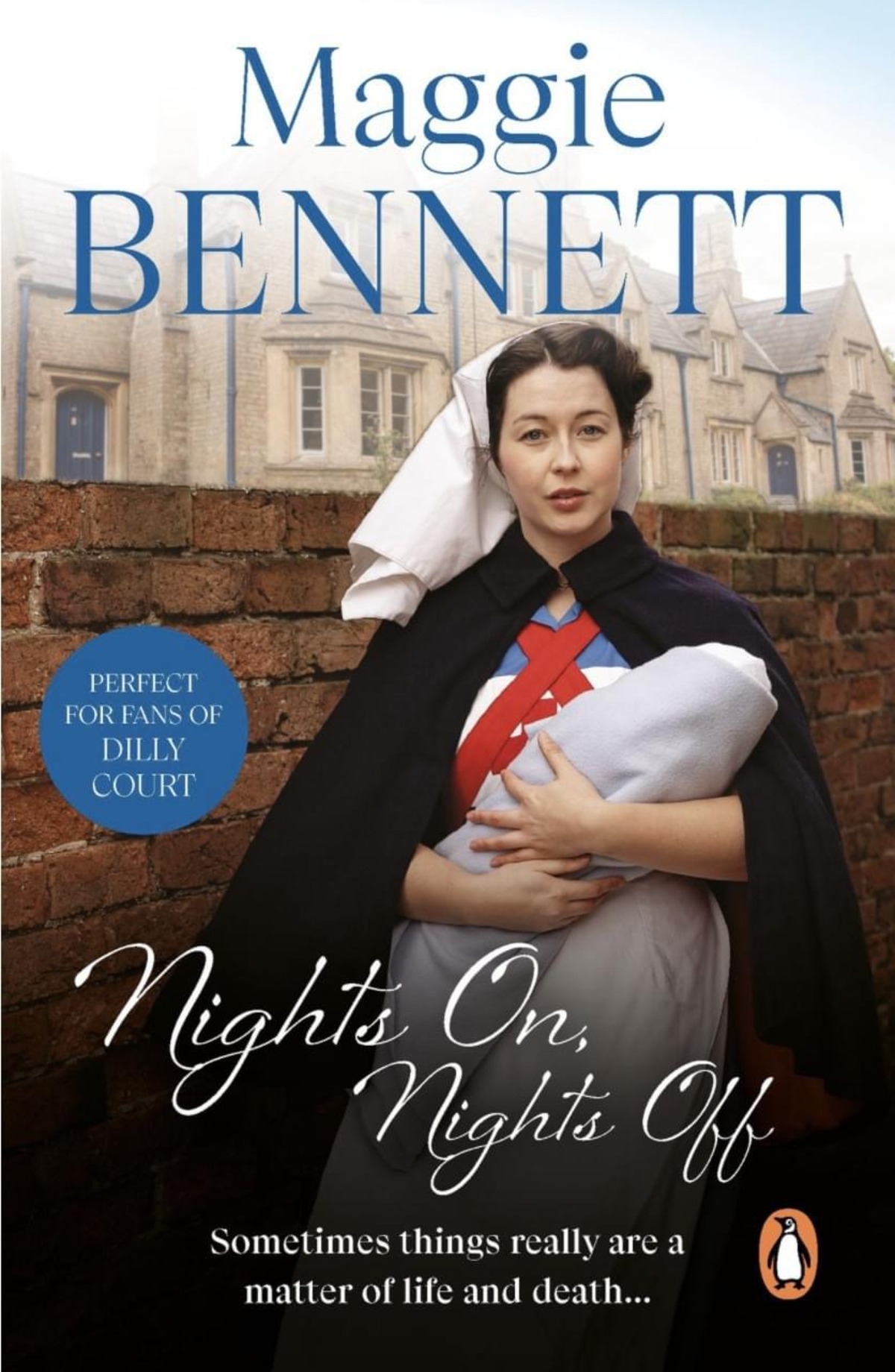 A woman dressed in a historical nurse uniform cradles a swaddled infant near a classic brick wall.