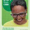 A smiling mature woman wearing modern glasses and a yellow top, featured in a commercial eyewear advertisement.